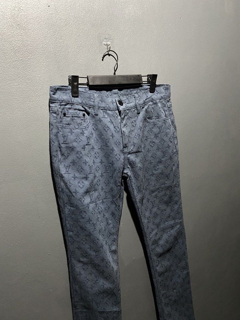 Louis Vuitton Monogram Denim Pants Dark Blue (Category: Jeans) located in Lucena. Submitted by handpickthrift (Listing ID 1468618370, Image 3). Description: - Color: Dark blue with all-over monogram pattern - Fit: Straight leg cut Size 30-31 - Design: Standard five-pocket style - Hardware: Branded button closure and engraved zipper pull - Material: High-quality denim with subtle woven detailing.