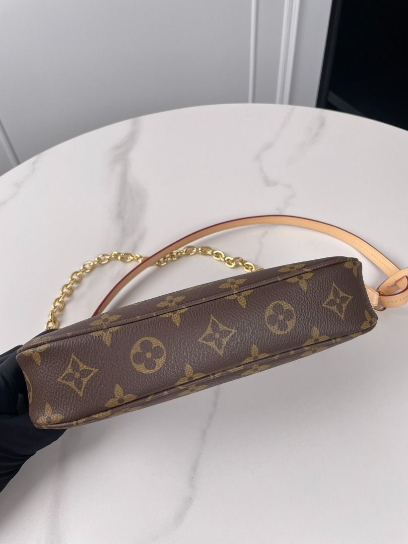 Louis Vuitton Monogram Pochette Accessories Bag(1.1) (Category: Luxury Bags & Wallets) located in Las Pinas. Submitted by epichorse-a4fff2 (Listing ID 1468581264, Image 3). Description: 'Comes with full packaging' Original order Mahjong bag M82766 exclusive real shots! This Pochette Accessoires bag features the classic Monogram canvas design, offering ample space with a zipper closure. Inside, there’s a zip pocket, slip pocket, and card slots to 