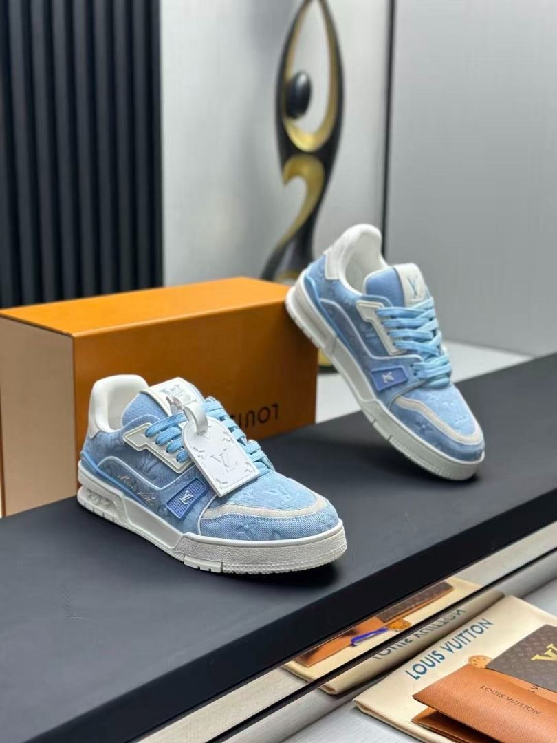 Louis Vuitton Trainer Sneaker Blue Denim (Category: Sneakers) located in Navotas City. Submitted by stevensmit50068 (Listing ID 1468564078, Image 3). Description: - 100% Authentic Louis Vuitton Trainer Sneakers - Material: Light blue monogram denim with white leather trim - Design: Embossed monogram pattern, flat light blue laces, and matching branded tongue tag - Sole: Chunky rubber sole with debossed Vuitton lettering on the bottom - Inclusions