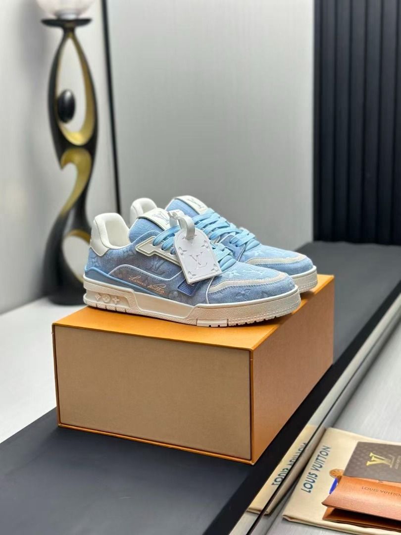 Louis Vuitton Trainer Sneaker Blue Denim (Category: Sneakers) located in Navotas City. Submitted by stevensmit50068 (Listing ID 1468564078, Image 2). Description: - 100% Authentic Louis Vuitton Trainer Sneakers - Material: Light blue monogram denim with white leather trim - Design: Embossed monogram pattern, flat light blue laces, and matching branded tongue tag - Sole: Chunky rubber sole with debossed Vuitton lettering on the bottom - Inclusions