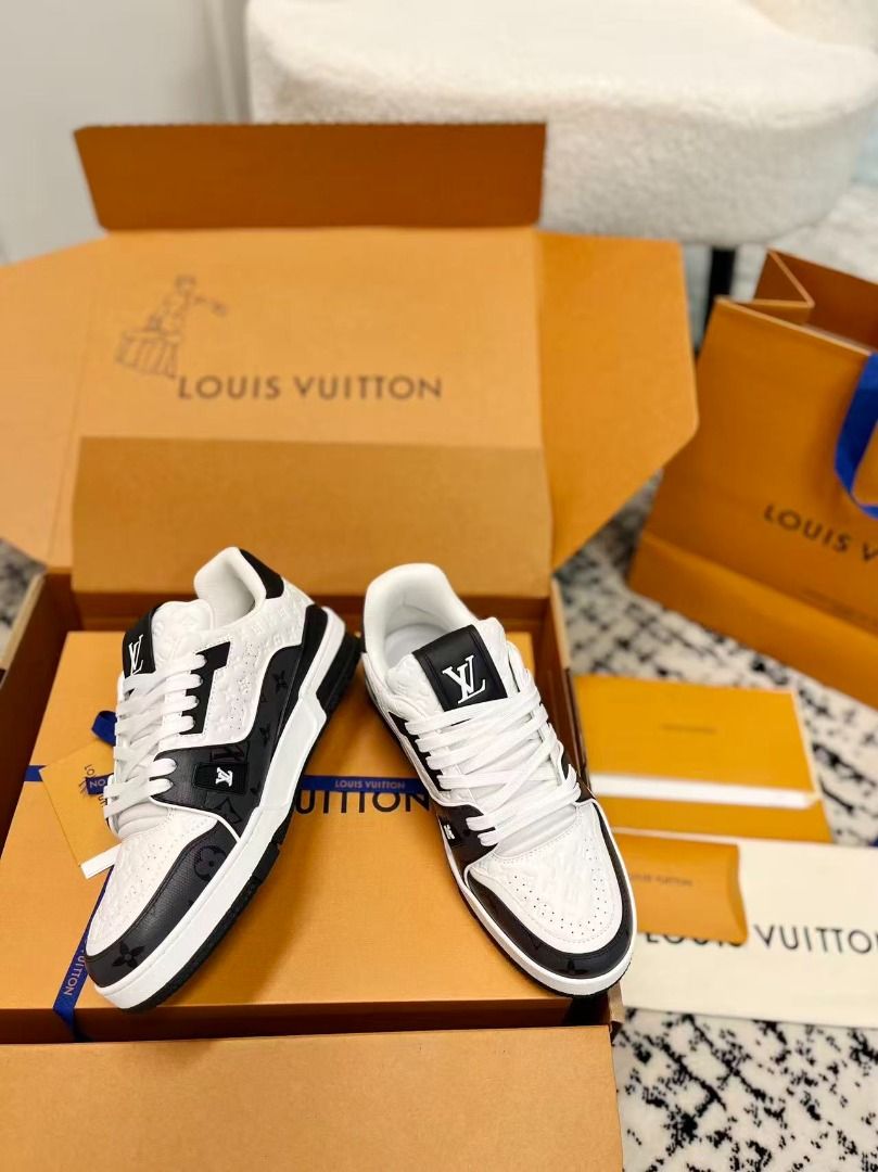 Louis Vuitton Trainer White Black Monogram Sneaker (Category: Sneakers) located in Quezon City. Submitted by grossoimor01025 (Listing ID 1468585378, Image 3). Description: - Brand: Louis Vuitton - Style: Trainer Sneakers (Black & White Monogram Debossed Leather) - Size: [Insert Size / EU / US] - Condition: [Insert Condition, e.g., Brand New / Mint / 9.5/10] - Features: White laces, LV branding on tongue & side, '#54' embroidery on heel, structure