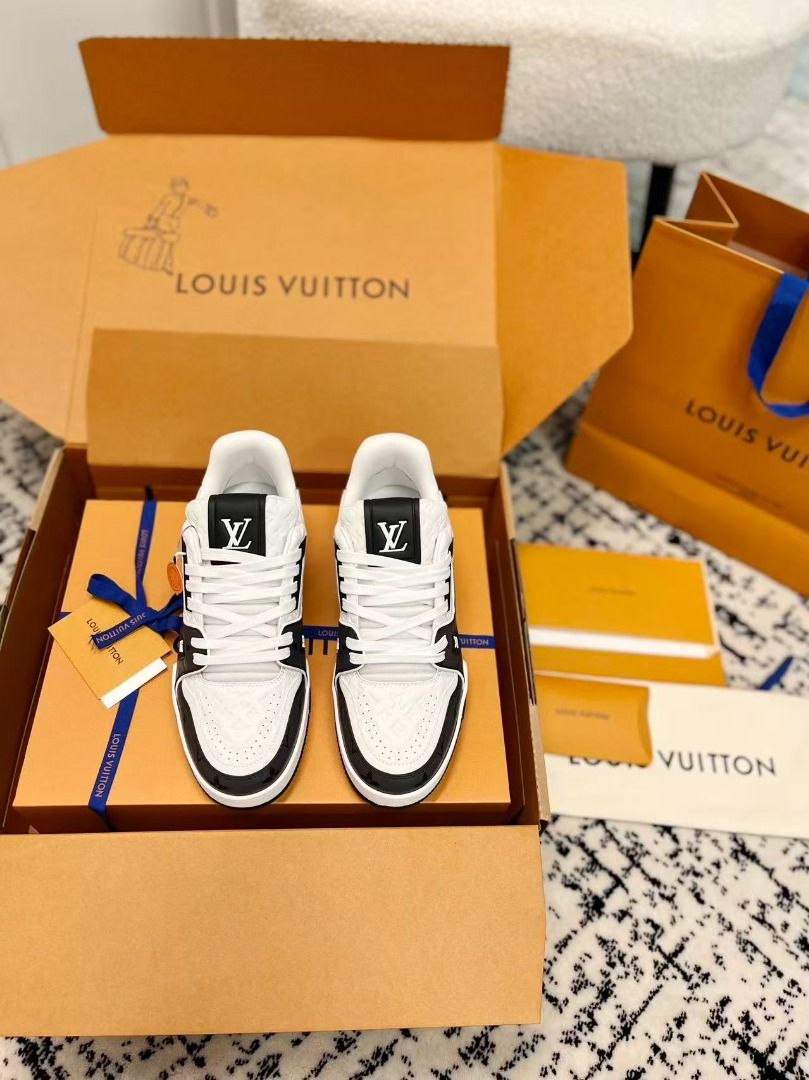 Louis Vuitton Trainer White Black Monogram Sneaker (Category: Sneakers) located in Quezon City. Submitted by grossoimor01025 (Listing ID 1468585378, Image 1). Description: - Brand: Louis Vuitton - Style: Trainer Sneakers (Black & White Monogram Debossed Leather) - Size: [Insert Size / EU / US] - Condition: [Insert Condition, e.g., Brand New / Mint / 9.5/10] - Features: White laces, LV branding on tongue & side, '#54' embroidery on heel, structure