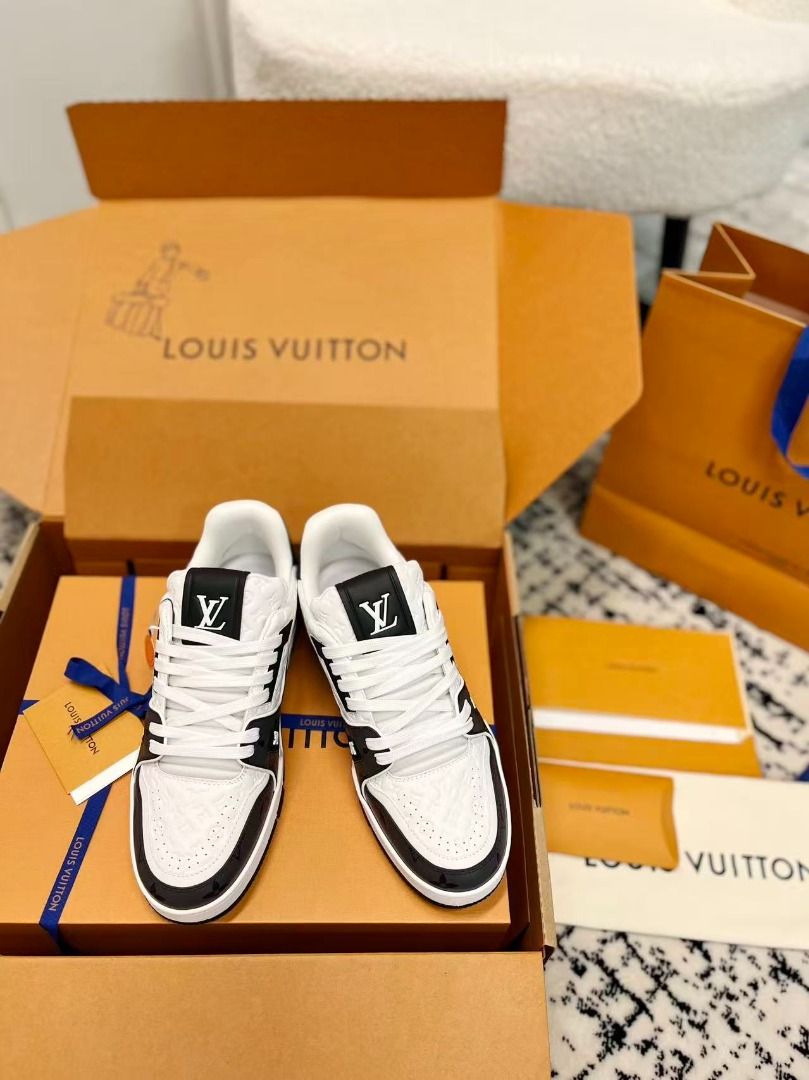 Louis Vuitton Trainer White Black Monogram Sneaker (Category: Sneakers) located in Quezon City. Submitted by grossoimor01025 (Listing ID 1468585378, Image 2). Description: - Brand: Louis Vuitton - Style: Trainer Sneakers (Black & White Monogram Debossed Leather) - Size: [Insert Size / EU / US] - Condition: [Insert Condition, e.g., Brand New / Mint / 9.5/10] - Features: White laces, LV branding on tongue & side, '#54' embroidery on heel, structure