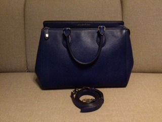 Louise Quatorze Preloved Bag (Category: Luxury Bags & Wallets) located in Quezon City. Submitted by margas_essentials (Listing ID 1468507000, Image 2). Description: Louise Quatorze 2-Way Bag Original Sling Strap Guaranteed Original Dark Blue in Color Semi Large Size Safiano Leather Gold Hardware Hologram Lining Clean inside out With signs of use but very tolerable (see last 5 photos) Payment first before shipping Payment via fund transfer to my b