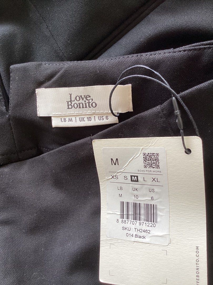 Love, Bonito Black Pants Size M (Category: Jeans) located in Bacoor. Submitted by cts217 (Listing ID 1468507772, Image 3). Description: - Brand: Love, Bonito - Condition: Brand new with tags attached, never worn - Size: Medium (UK 10 / US 6) - Color: True dark black - Style: Straight leg silhouette with structured front and back waist seaming - Perfect for workwear or minimalist casual styling.