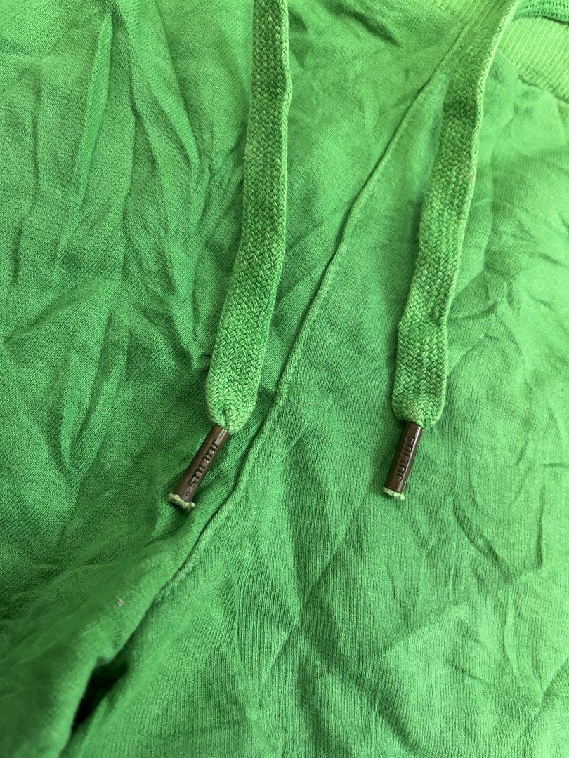Love Julius Green Monkey Graphic Drawstring Shorts Size L (Category: Shorts) located in Mabalacat. Submitted by aas_thriftfings (Listing ID 1468577289, Image 3). Description: - Brand: Love Julius - Color: Bright green - Size: L (Waist 30, Length 12) - Material: 100% cotton - Features: Elastic drawstring waist with branded metal aglets - Details: Cute embroidered monkey and elephant patch on the lower left leg, two side pockets, and decorative whi
