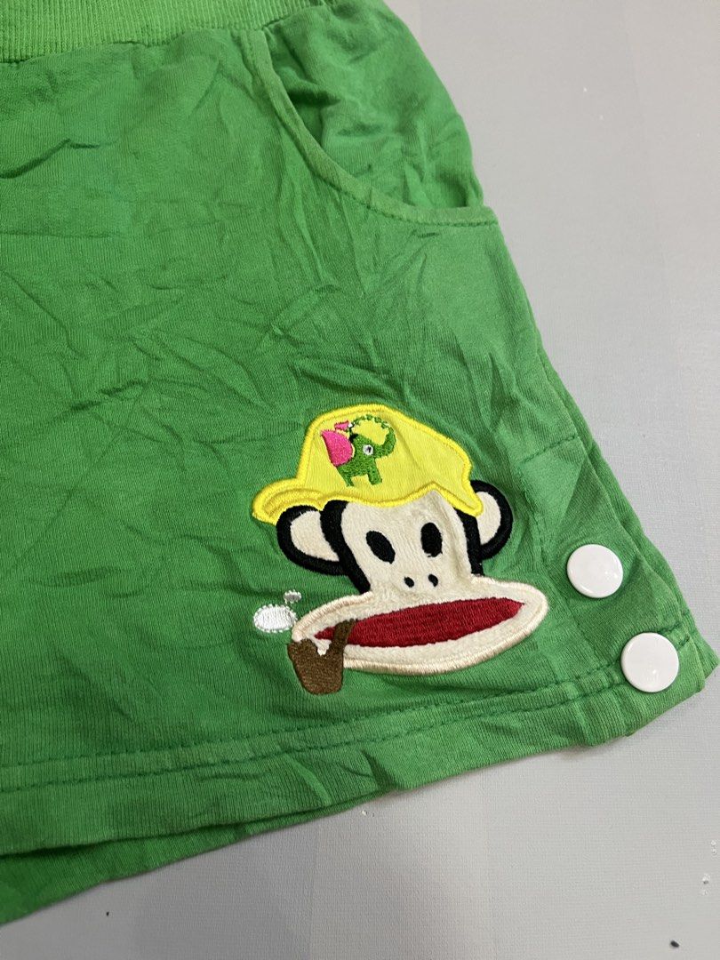 Love Julius Green Monkey Graphic Drawstring Shorts Size L (Category: Shorts) located in Mabalacat. Submitted by aas_thriftfings (Listing ID 1468577289, Image 2). Description: - Brand: Love Julius - Color: Bright green - Size: L (Waist 30, Length 12) - Material: 100% cotton - Features: Elastic drawstring waist with branded metal aglets - Details: Cute embroidered monkey and elephant patch on the lower left leg, two side pockets, and decorative whi