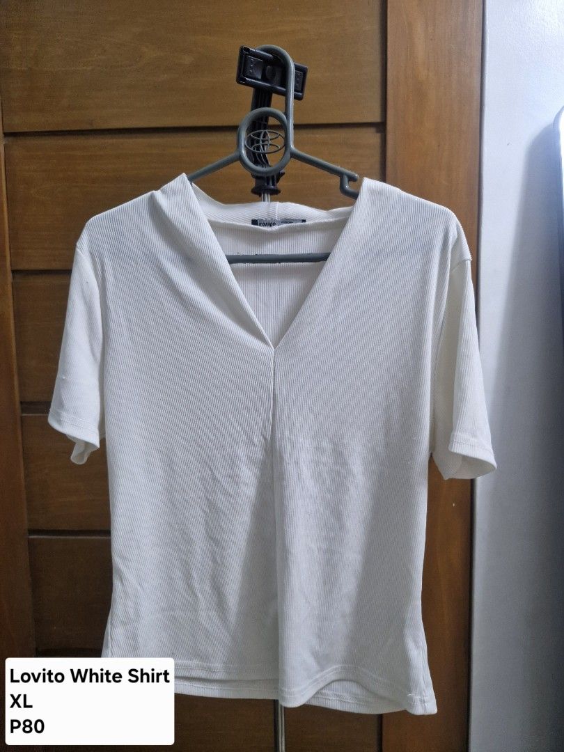 Lovito White Shirt XL (Category: Tshirts & Polo Shirts ) located in Manila. Submitted by rein.beyaa (Listing ID 1468712184, Image 1). Description: - Brand: Lovito - Size: XL - Color: Clean White - Material: Stretch ribbed fabric - Design: V-neck collar with short sleeves - Style: Comfortable for daily wear, easy to match with jeans or skirts.