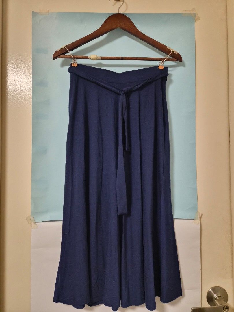 LTB Navy Blue Midi Skirt Size S (Category: Jeans) located in Manila. Submitted by prelovedbyc.hannah (Listing ID 1468583066, Image 1). Description: - Brand: LTB Turkey - Size: Small - Color: Solid navy blue (easy to match with any top) - Material: 64% polyester, 31% viscose, 5% elastane (comfortable with a bit of stretch) - Design: Stylish tied waist in the front.