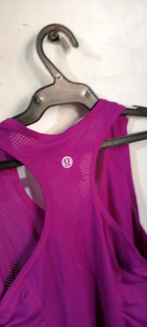 Lululemon Athletic Purple Tank Top Size 4 (Category: Sleeveless) located in Manila. Submitted by ezekislacl02490 (Listing ID 1468587982, Image 3). Description: - Brand: Lululemon - Size: 4 (tag intact) - Color: Bright purple - Design: Classic racerback with all-over breathable mesh fabric - Details: Reflective omega logo on upper back for visibility - Ideal for: Running, gym workouts, and active lifestyle - Condition: Excellent pre-loved conditio