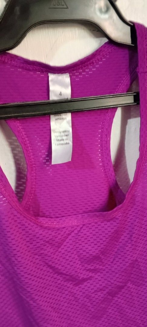 Lululemon Athletic Purple Tank Top Size 4 (Category: Sleeveless) located in Manila. Submitted by ezekislacl02490 (Listing ID 1468587982, Image 2). Description: - Brand: Lululemon - Size: 4 (tag intact) - Color: Bright purple - Design: Classic racerback with all-over breathable mesh fabric - Details: Reflective omega logo on upper back for visibility - Ideal for: Running, gym workouts, and active lifestyle - Condition: Excellent pre-loved conditio