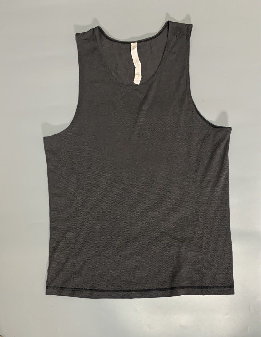 Lululemon Athletic Tank Top Size M Grey (Category: Activewear) located in Cebu City. Submitted by stuff_paid (Listing ID 1468639560, Image 1). Description: - Brand: Lululemon - Style: Sleeveless athletic pullover tank top - Color: Grey - Size: M - Material: High-performance blend (Nylon, Polyester, Lycra Elastane, and X-Static Nylon) - Details: Classic reflective Lululemon logo printed on the upper back - Condition: Clean fabric texture, excellen