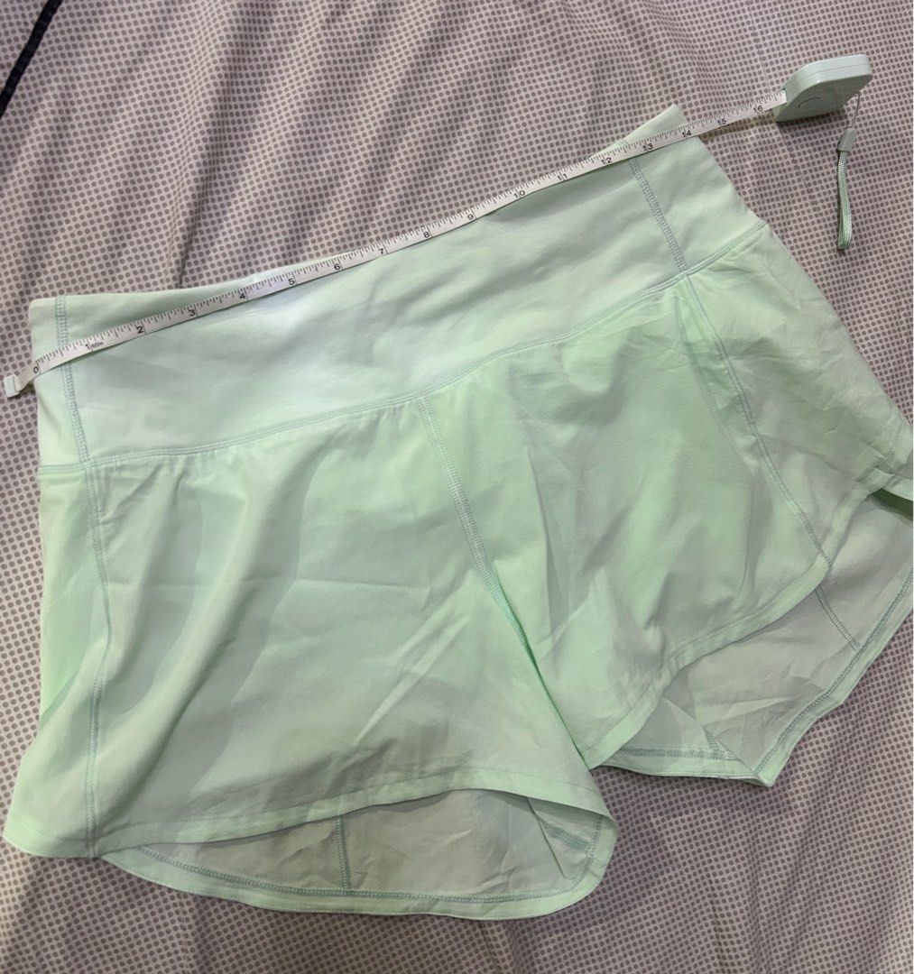Lululemon Speed Up Shorts Light Green (Category: Shorts) located in Cainta. Submitted by unboxingstuff (Listing ID 1468608715, Image 3). Description: - Brand: Lululemon - Color: Mint green - Condition: Mint / Excellent - Size/Measurements: Waist ~14 inches laid flat, length ~10.5 inches - Features: Built-in liner, secure back zipper pocket for keys/cards - Fabric: Super lightweight, ideal for running, gym, and workouts.