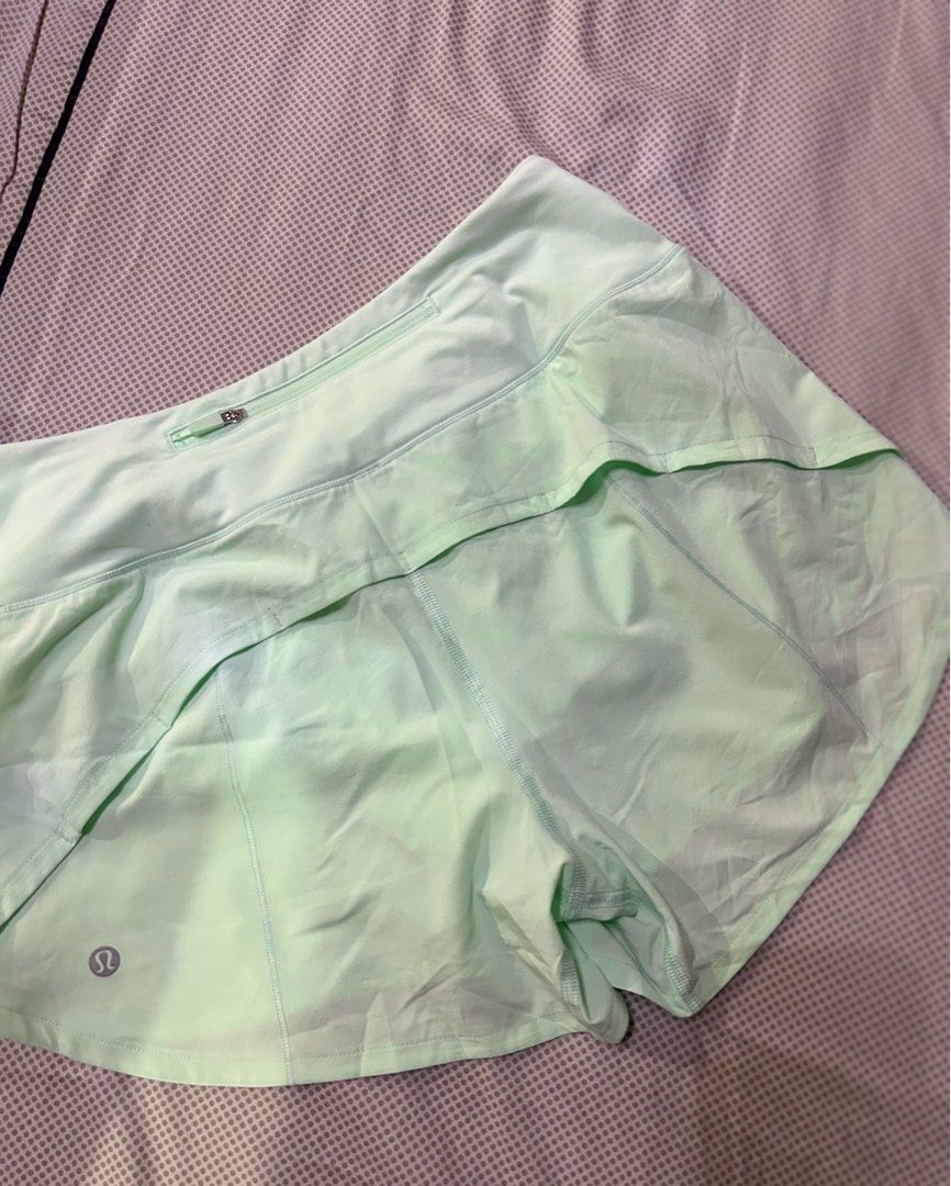 Lululemon Speed Up Shorts Light Green (Category: Shorts) located in Cainta. Submitted by unboxingstuff (Listing ID 1468608715, Image 2). Description: - Brand: Lululemon - Color: Mint green - Condition: Mint / Excellent - Size/Measurements: Waist ~14 inches laid flat, length ~10.5 inches - Features: Built-in liner, secure back zipper pocket for keys/cards - Fabric: Super lightweight, ideal for running, gym, and workouts.