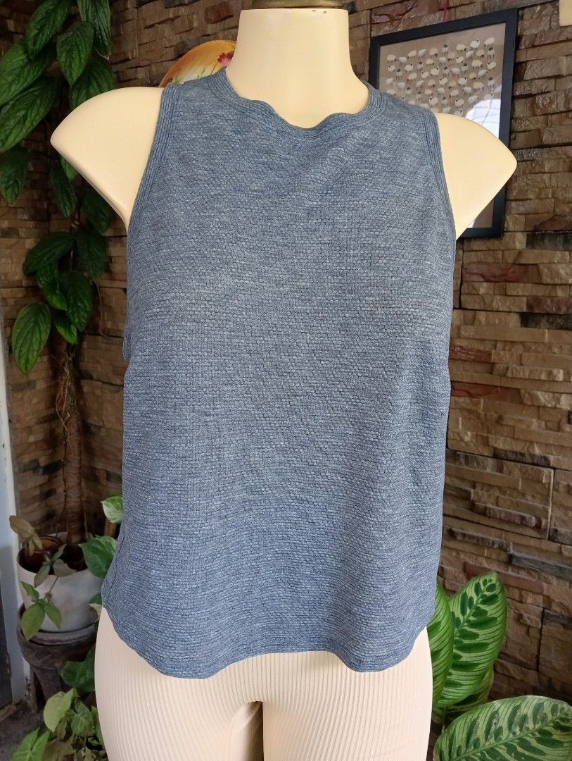 Lululemon Tank Top (Category: Activewear) located in Rizal. Submitted by timeless_shop (Listing ID 1468541067, Image 3). Description: ORIGINAL Lululemon Grey Tank Top - Textured - Size 6 📏 Width: 14 inches lay flat 📏 Length: 20 inches 📏 Bust: Kasya 32-34 inches 🎨 Color: Heather Grey / Slate Grey ✂️ Style: Racerback Muscle Tank - textured / waffle fabric! 💯 Condition: 9.8/10 Good Condition - Like New! ✨ 🎨 Color Rate: 9.8/10 - Slate Gray Maay