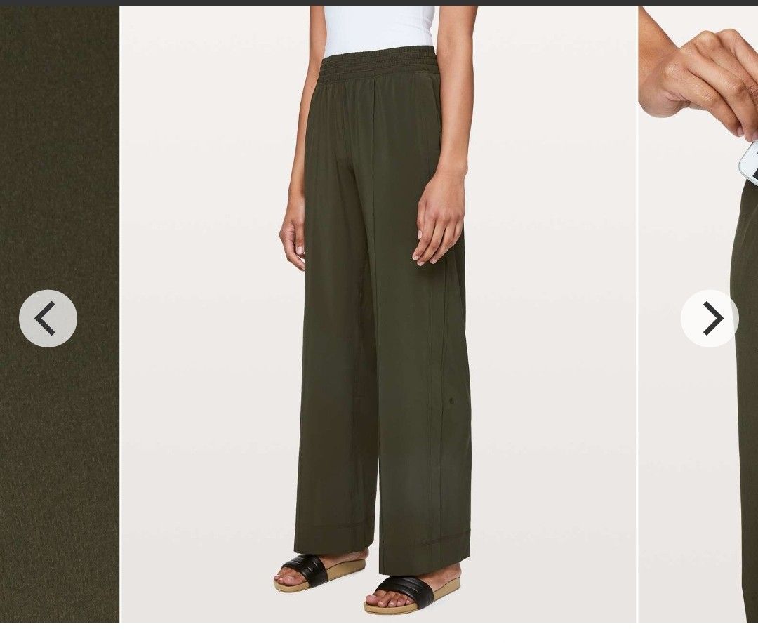 Lululemon Wanderer Wide Leg Pants (Category: Joggers) located in Santa Rosa. Submitted by y2kstylist (Listing ID 1467256113, Image 2). Description: - Brand: Lululemon - Color: Olive Green - Size: 10 (170/78Y) - Fit: Relaxed wide-leg with front seam detailing - Waistband: Elastic with adjustable drawstring - Logo: Subtle omega logo near bottom hem - Material: Lightweight, easy pull-on fabric - Condition: Excellent - Best for: Workouts, errands, or
