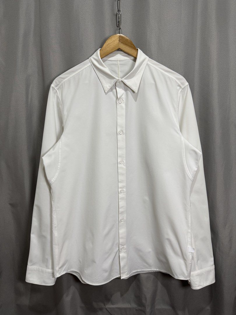 Lululemon White Buttondown Polo L/s (Category: Formal Shirts) located in Meycauayan. Submitted by itstimothrifts (Listing ID 1468595845, Image 1). Description: Lululemon White Buttondown Polo L/s Excellent Condition Need rewash Large W 22 L 30.