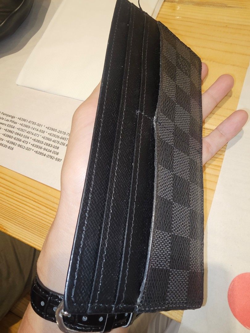 LV card holder (Category: Luxury Bags & Wallets) located in Mandaluyong City. Submitted by bethco (Listing ID 1468581960, Image 2). Description: - Brand: Louis Vuitton - Model: Damier Card Holder - Color: Classic Black & Grey Checkered - Features: Slim design with multiple card slots for easy organization - Condition: Good pre-loved condition (as shown in photos) - Delivery/Meetup: Meetups at Glorietta Mall, Ayala Center, Makati.