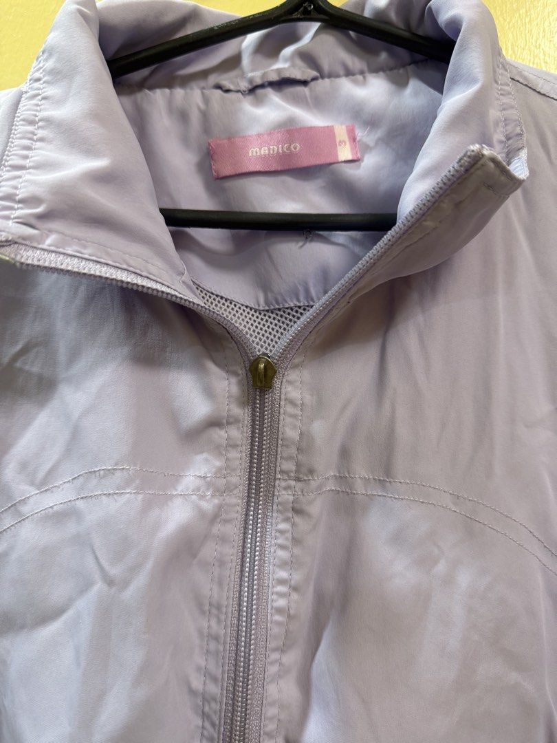Madico Light Purple Zip-Up Jacket Size S (Category: Coats, Jackets and Outerwear) located in Makati City. Submitted by shoprory (Listing ID 1468596184, Image 2). Description: - Brand: Madico - Size: S - Color: Light purple - Design: Full front zipper, collar neck, and ribbed cuffs - Details: Lightweight fabric with stylish mesh detailing near the collar and a back horizontal shoulder seam - Condition:missing zipper handle - Perfect for: Breezy we