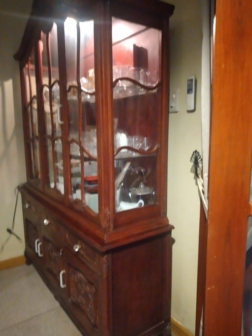 Mahogany china cabinet (Category: Other Home Furniture) located in Quezon City. Submitted by janet.melgarejo.lao (Listing ID 1468709478, Image 2). Description: made of mahogany wood, with shelves and light. Lower enclosed shelves for more storage..