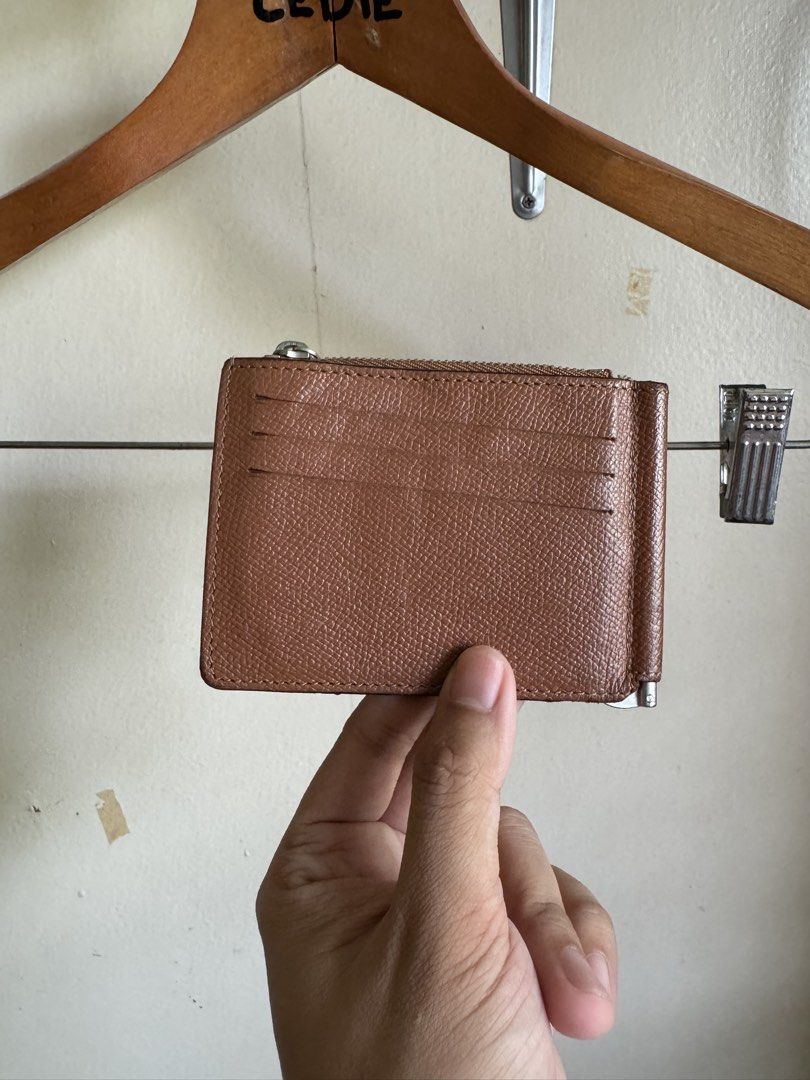 Maison magriela clip wallet (Category: Wallets & Card Holders) located in Davao. Submitted by fafacedie (Listing ID 1468631040, Image 2). Description: Maison MargieIa clip wallet card holder Genuine leather Very good condition. Signs of usage sa sidings 2k+sf.