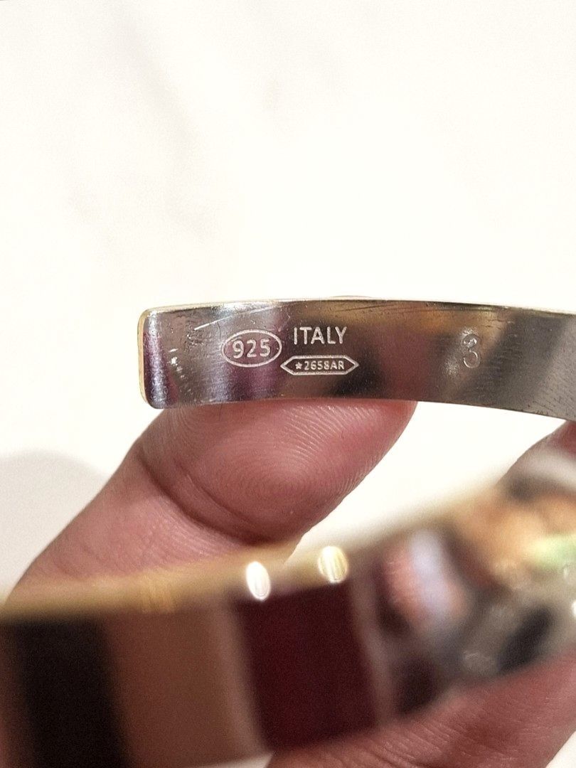 Maison Margiela AW25 Numeric Twisted Bracelet (Authentic) (Category: Bracelets) located in Pasig City. Submitted by coveted.mnl (Listing ID 1468165587, Image 3). Description: Authentic📌 Thrifted piece, has a few soft scratches and needs polishing~ Men's Size. Rhinestone / Diamond still intact No box. No Inclusions. Comes as is🤍 9.5/10 overall condition No issues or flaws in fabric Retailed for $1,885 (P116,870) • P19,999 Slightly negotiable • P