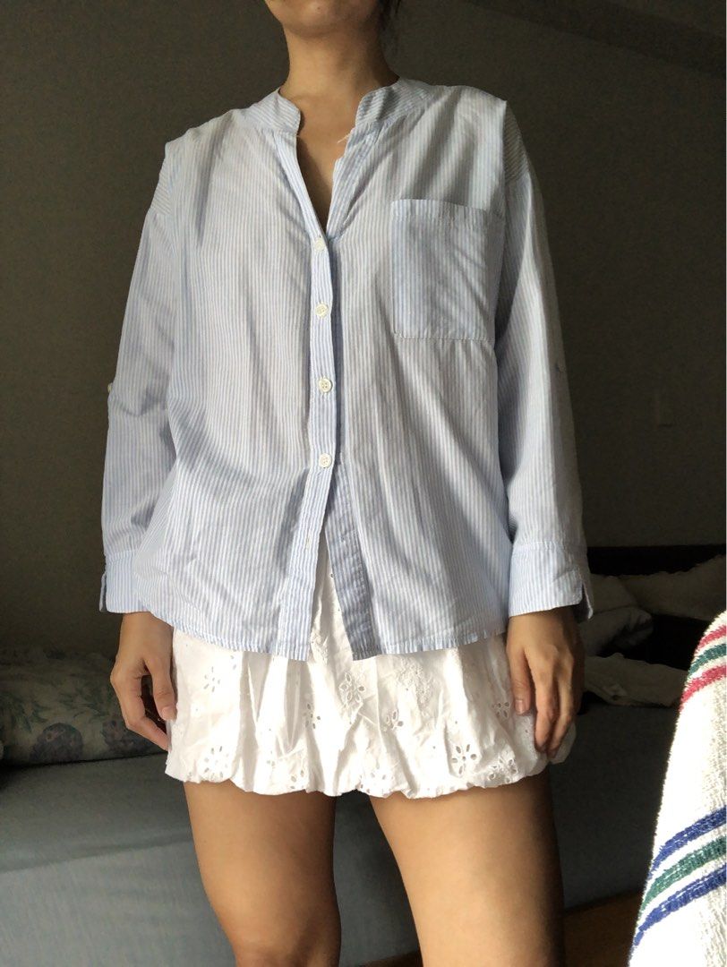 Mandarin collar longsleeve blouse (Category: Longsleeves) located in Makati City. Submitted by magwayr19 (Listing ID 1468511182, Image 2). Description: - Color & Pattern: Blue and white stripes - Fit: Loose oversized fit for ultimate comfort - Design: Mandarin collar, single chest pocket, and front button closure - Style: Casual daily wear - No brand .