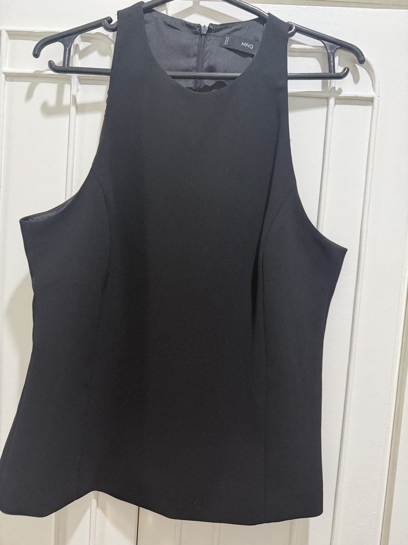 MANGO Black Sleeveless Top | Size S (Category: Sleeveless) located in Paranaque City. Submitted by balofies (Listing ID 1468641642, Image 2). Description: ✨ Details: * Brand: MNG (Mango) * Size: S (EU/USA S) * Color: Black * Style: Sleeveless, scoop-neck top * Closure: Back zipper * Design: Structured fit with contouring seams.
