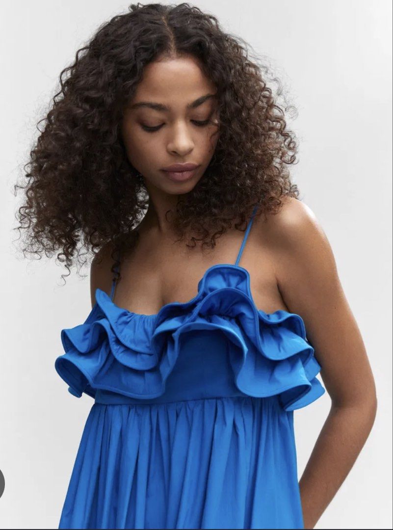 Mango Blue Ruffled Midi Dress with Spaghetti Straps (Category: Dresses) located in Munoz. Submitted by Liiz27 (Listing ID 1468595385, Image 3). Description: - Color: Bright blue - Style: Midi length dress with flowy pleated skirt - Details: Ruffled neckline and thin spaghetti straps - Material: Lightweight, breathable cotton (great for the PH weather!) - Fit: Easy pull-on style.
