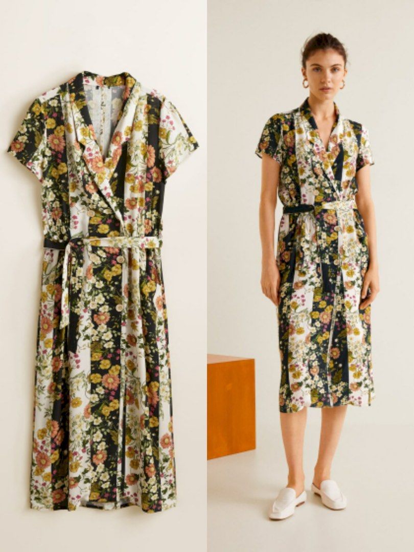 Mango Floral Wrap Midi Dress Size L (Category: Dresses) located in Candelaria. Submitted by azielkob (Listing ID 1468562479, Image 1). Description: - Brand: Mango - Style: Floral midi dress with vertical stripes - Details: Short sleeves, lapel collar, double-breasted button front, matching fabric waist tie belt - Color Palette: Black, white, yellow, and pink - Fabric: Viscose - Size: Large on tag .
