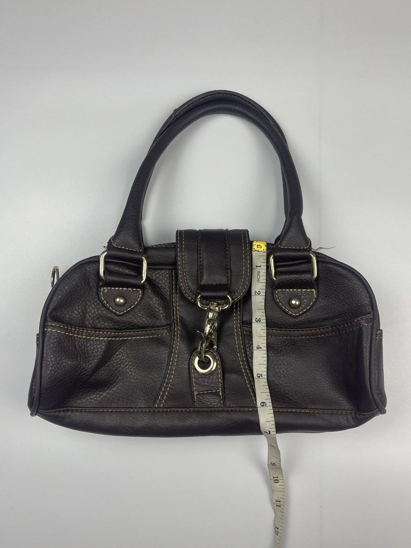 MANGO (MNG) VINTAGE HARDWARE SATCHEL / SHOULDER BAG (Category: Shoulder Bags) located in Cagayan de Oro. Submitted by kmcurations (Listing ID 1468549827, Image 2). Description: MANGO (MNG) VINTAGE HARDWARE SATCHEL / SHOULDER BAG Details & Dimensions: • Material: Grained Faux Leather / Leather-look body in Dark Chocolate Brown with contrast stitching • Interior: Black monogram branded lining with internal zip pocket • Hardware: Silver-tone oversiz