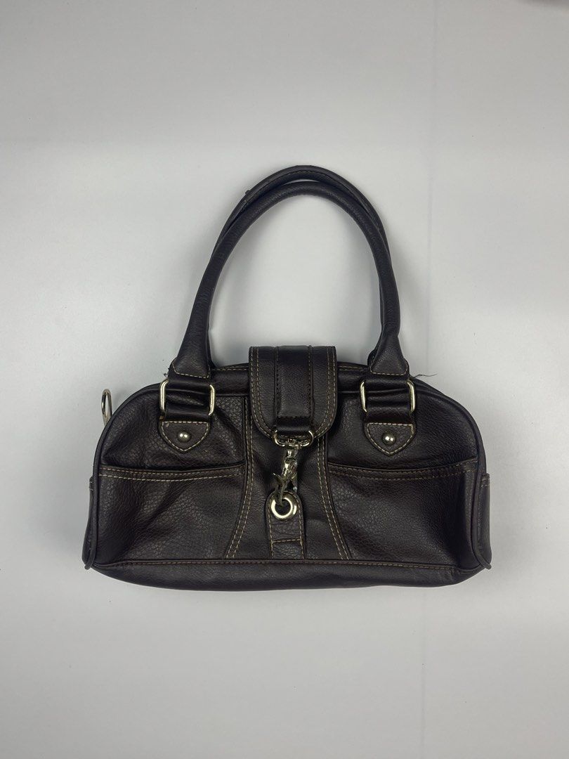 MANGO (MNG) VINTAGE HARDWARE SATCHEL / SHOULDER BAG (Category: Shoulder Bags) located in Cagayan de Oro. Submitted by kmcurations (Listing ID 1468549827, Image 1). Description: MANGO (MNG) VINTAGE HARDWARE SATCHEL / SHOULDER BAG Details & Dimensions: • Material: Grained Faux Leather / Leather-look body in Dark Chocolate Brown with contrast stitching • Interior: Black monogram branded lining with internal zip pocket • Hardware: Silver-tone oversiz