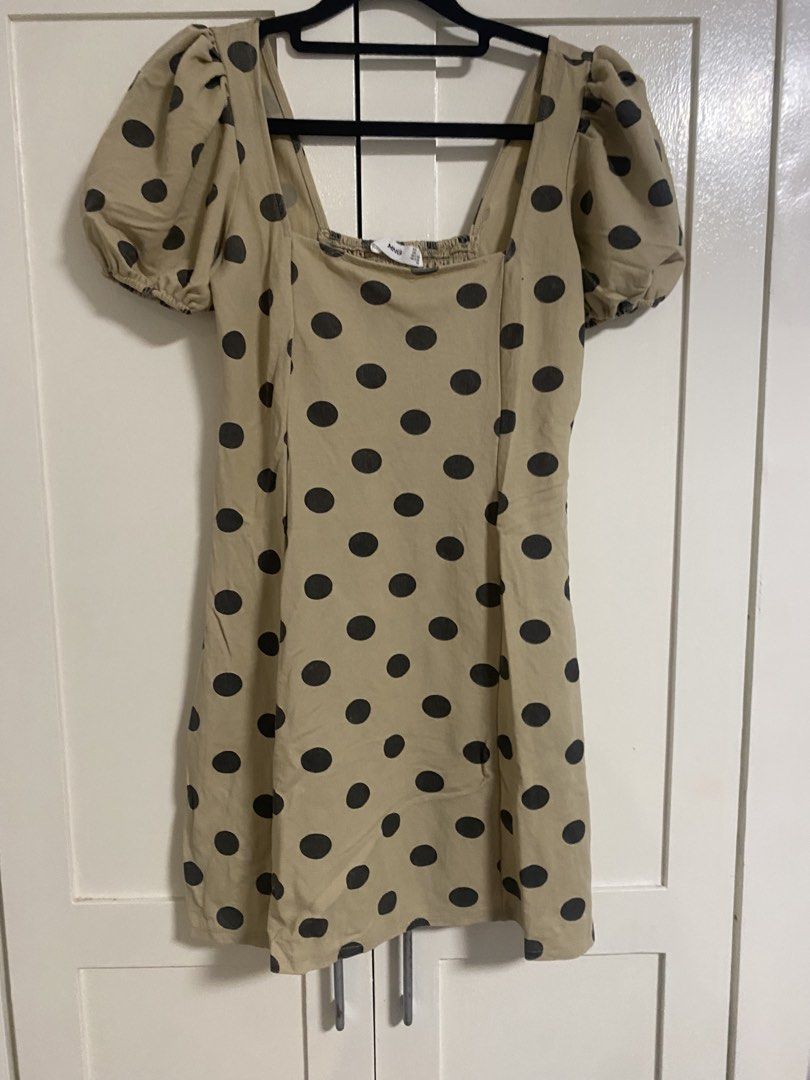 Mango Polka Dot Puff Sleeve Dress (Category: Dresses) located in Manila. Submitted by ms_spidey (Listing ID 1468560960, Image 1). Description: - Color & Pattern: Classic beige with all-over black polka dots - Design: Trendy square neckline and cute short puff sleeves - Fit: Comfortable smocked back panel for easy wear - Fabric: Lightweight and breathable, ideal for everyday casual outings - Sizing: Please refer to the brand tag shown in the photo