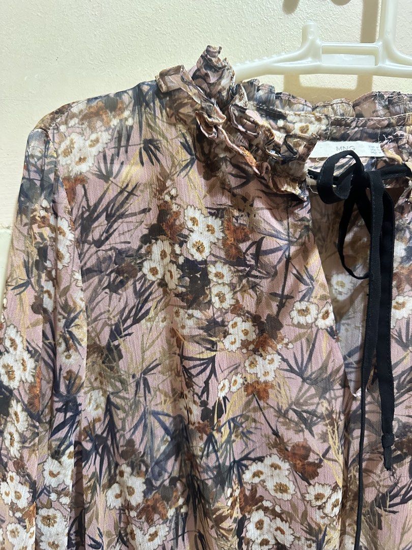 Mango Sheer Floral Midi Dress Ruffled Collar (Category: Dresses) located in Baliuag. Submitted by ritzkisses (Listing ID 1468517841, Image 2). Description: - Brand: Mango - Style: Casual midi dress - Color/Pattern: Pinkish brownish tone with dark floral prints - Details: Long sleeves with ruffled cuffs, high ruffled neckline with front tie string, elasticized waist for an easy fit - Fabric: Lightweight, sheer - Size: EUR M / USA S / MEX M.