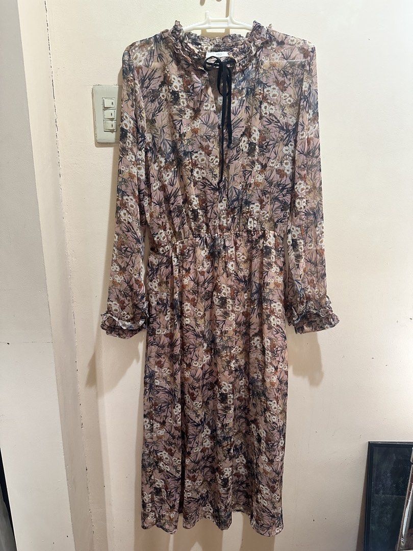 Mango Sheer Floral Midi Dress Ruffled Collar (Category: Dresses) located in Baliuag. Submitted by ritzkisses (Listing ID 1468517841, Image 1). Description: - Brand: Mango - Style: Casual midi dress - Color/Pattern: Pinkish brownish tone with dark floral prints - Details: Long sleeves with ruffled cuffs, high ruffled neckline with front tie string, elasticized waist for an easy fit - Fabric: Lightweight, sheer - Size: EUR M / USA S / MEX M.