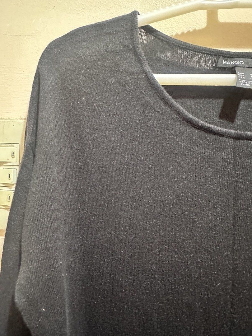 Mango Suit Black Knit Dress Size M (Category: Dresses) located in Baliuag. Submitted by ritzkisses (Listing ID 1468519679, Image 3). Description: - Brand/Line: Mango Suit - Style: Black knit long-sleeve dress with round neckline and relaxed fit - Detail: Charming lace trim along the bottom hem - Size: Medium - Versatility: Comfortable everyday piece, perfect to style with boots or leggings - Condition: Easy throw-on-and-go outfit.