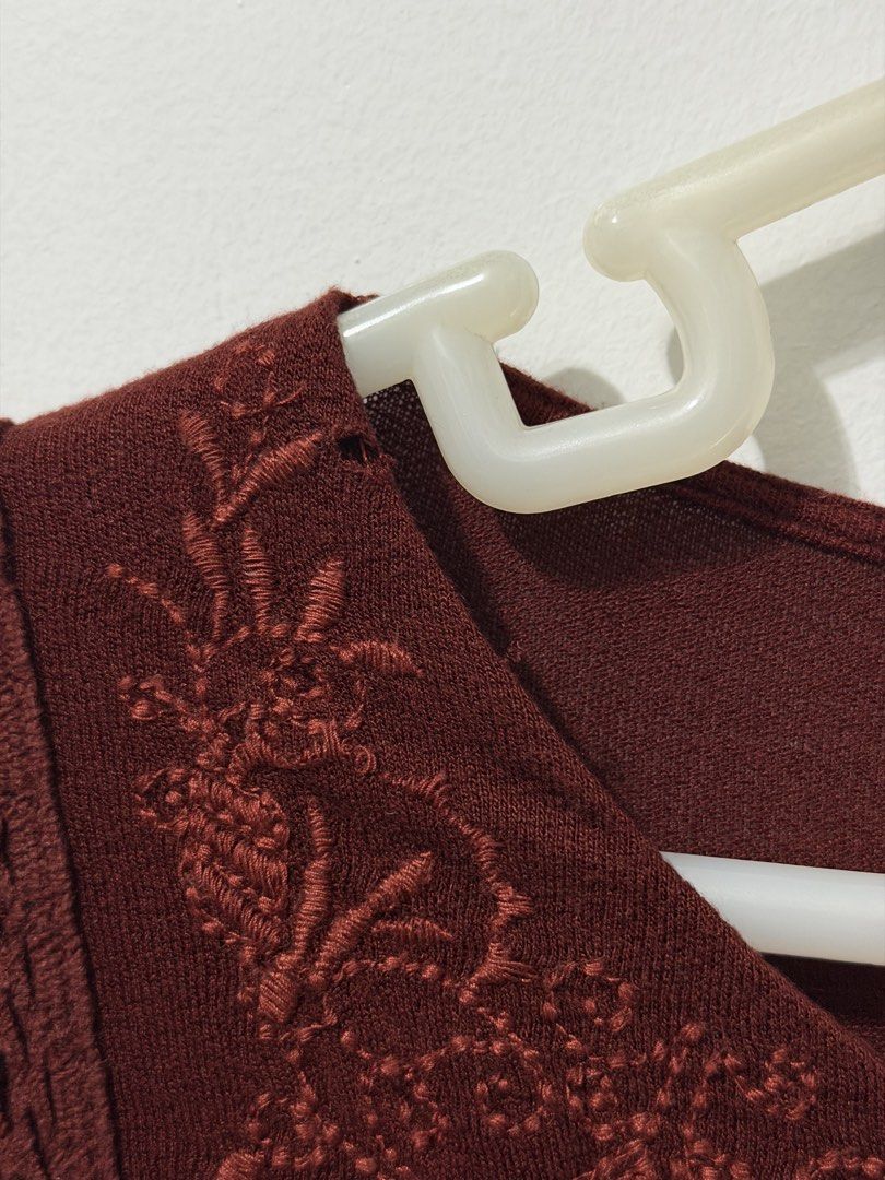 Mango Suit Boho Dress (Category: Dresses) located in Malolos. Submitted by eadiana (Listing ID 1468576004, Image 3). Description: - flaw ‼️: small hole as shown on photo - Brand/Style: Mango Suit tunic dress - Color: Deep Maroon - Size: EUR S / USA XS - Details: Detailed embroidery with tassel ties, lace panels on front and sides - Sleeves: Long sleeves with flared cuffs - Hemline: High-low hem - Material: Lightweight, comfortable fabric - Condit