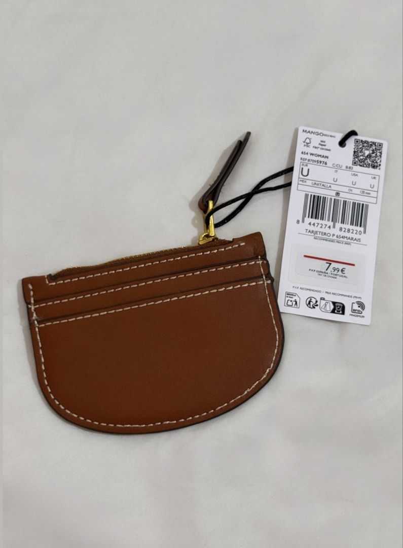 Mango Wallet (Category: Wallets & Card holders) located in Quezon City. Submitted by shopper_xoxo (Listing ID 1468513325, Image 2). Description: Brand new with tag 😊 📦 From Zara Japan 🚚 On hand and ready to ship MOP: GCash and BPI Shipping starts at ₱65 only ✨ .