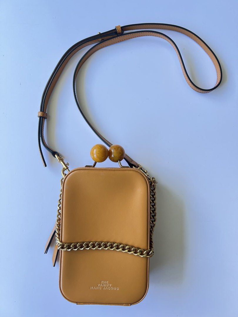 MARC JACOBS - THE VANITY LEATHER CROSSBODY BAG (Category: Luxury Bags & Wallets) located in Cavite. Submitted by _Gizmo (Listing ID 1468582475, Image 2). Description: Marc Jacobs - The Vanity Crossbody Leather Bag Measurement Width: 5’ Inch Height: 7.5’ Inch Depth: 2.5’ Inch Condition: 9/10 No major flaws .