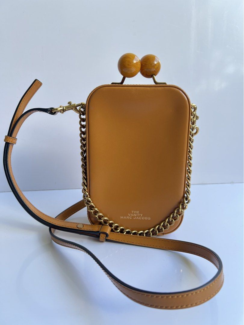 MARC JACOBS - THE VANITY LEATHER CROSSBODY BAG (Category: Luxury Bags & Wallets) located in Cavite. Submitted by _Gizmo (Listing ID 1468582475, Image 1). Description: Marc Jacobs - The Vanity Crossbody Leather Bag Measurement Width: 5’ Inch Height: 7.5’ Inch Depth: 2.5’ Inch Condition: 9/10 No major flaws .