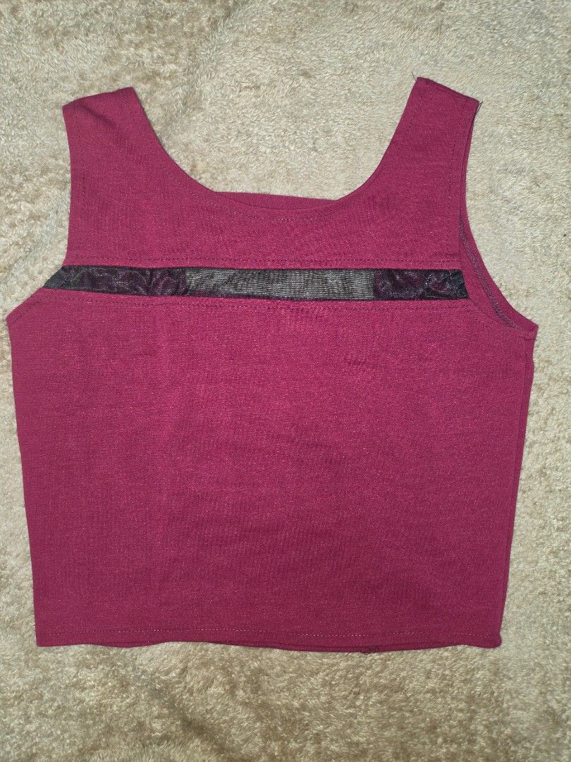 Maroon Crop Tank Top with Strappy Back and Mesh Panel (Category: Sleeveless) located in Manila. Submitted by _sj1204 (Listing ID 1468554242, Image 2). Description: - Color: Maroon - Style: Crop tank top with scoop neckline - Design: Sheer mesh stripe on the chest and trendy multi-strap cut-out back - Material: Stretchy, comfortable fabric - Best for: Casual days - Size: XS to S .