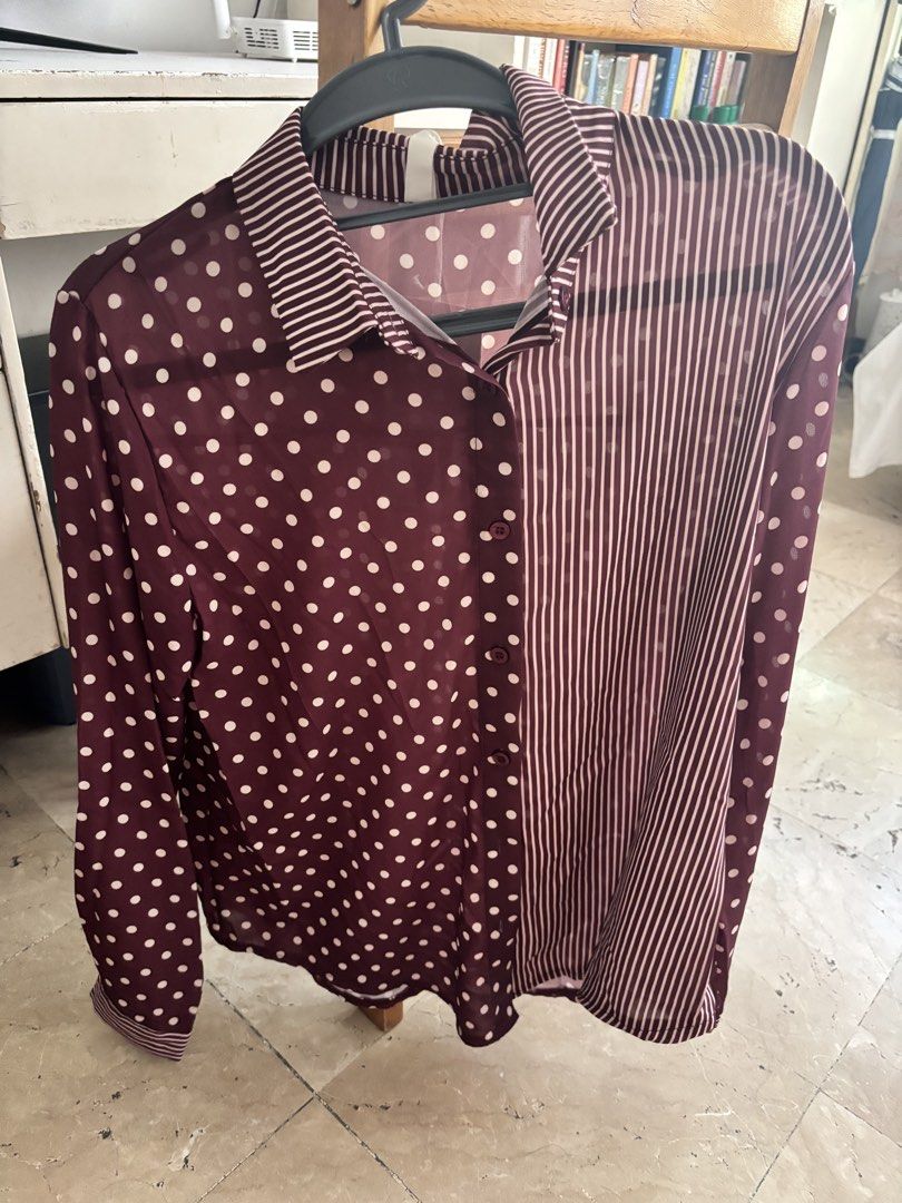 Maroon Polka Dot and Striped Long Sleeve Button-Down Blouse (Category: Blouses) located in Bacolod City. Submitted by theresuhhhh (Listing ID 1468553542, Image 1). Description: - Unique mixed-pattern design: polka dots on one side, vertical stripes on the other - Color: Rich maroon and white - Features: Button-up front, pointed collar, long sleeves with button cuffs - Fabric: Lightweight and slightly sheer - Versatile: Easy to style for work or c