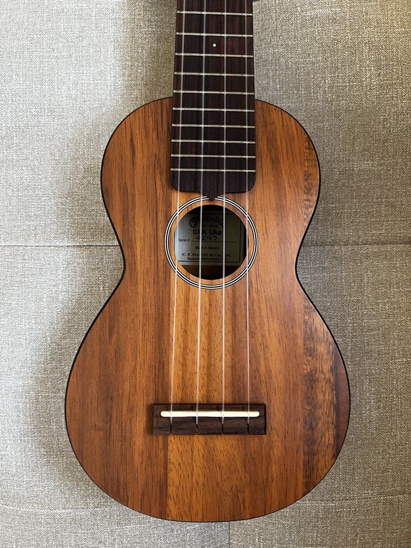 Martin OXK Soprano Ukulele (Category: Musical Instruments) located in Dagupan City. Submitted by rick.cas (Listing ID 1468558669, Image 2). Description: Martin OXK Soprano Ukulele Inclusions: - Original Martin gigbag Info: - Built from High-Pressure Laminate (HPL) - It’s very light (approximately 340g), and it features printed Hawaiian Koa grain pattern - Recently installed Martin M600 fluorocarbon strings. ₱15,000 Meetup at Dagupan City, Pangasi