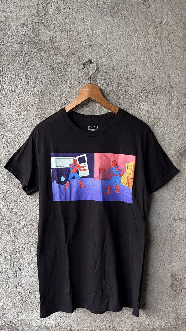 Marvel Spider-Man Meme Graphic T-Shirt (Category: Tshirts & Polo Shirts ) located in Cabuyao City. Submitted by bulandos (Listing ID 1468636643, Image 1). Description: - Brand: Mad Engine - Design: Classic Spider-Man pointing meme graphic - Color: Black - Size: Small - Material: 100% Cotton - Condition: Pre-loved, washed inside out per tag instructions - Style: Standard short sleeve casual shirt.