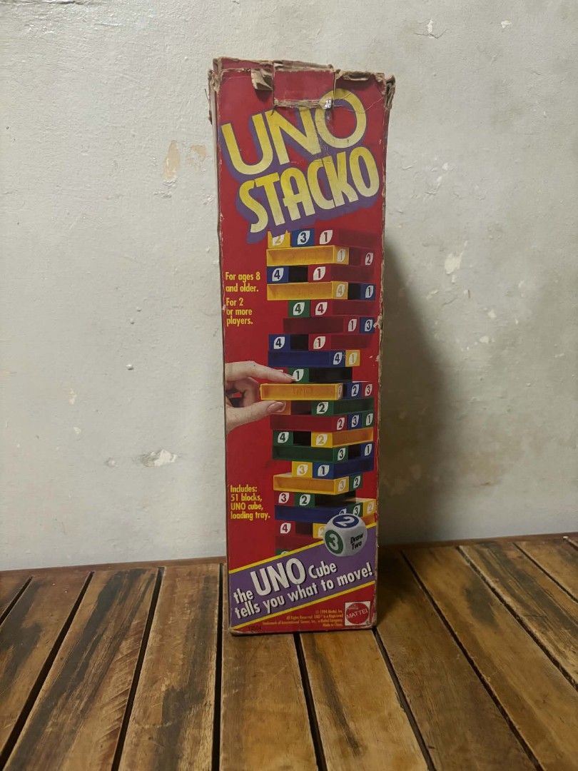 Mattel UNO Stacko Stacking Tower Game (Category: Board Games & Puzzles) located in Caloocan City. Submitted by joshuadyogi0122 (Listing ID 1468512159, Image 1). Description: - Authentic Mattel UNO Stacko game - Combines classic tower stacking with fun UNO rules, colors, and numbers - Set includes 51 wooden-style blocks, 1 UNO custom die, and a loading tray - For ages 8 and up, ideal for 2 or more players.
