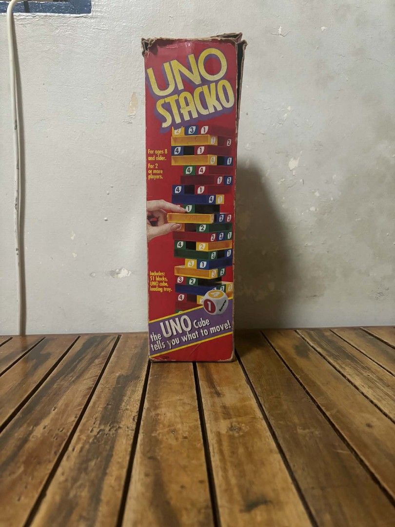 Mattel UNO Stacko Stacking Tower Game (Category: Board Games & Puzzles) located in Caloocan City. Submitted by joshuadyogi0122 (Listing ID 1468512159, Image 2). Description: - Authentic Mattel UNO Stacko game - Combines classic tower stacking with fun UNO rules, colors, and numbers - Set includes 51 wooden-style blocks, 1 UNO custom die, and a loading tray - For ages 8 and up, ideal for 2 or more players.