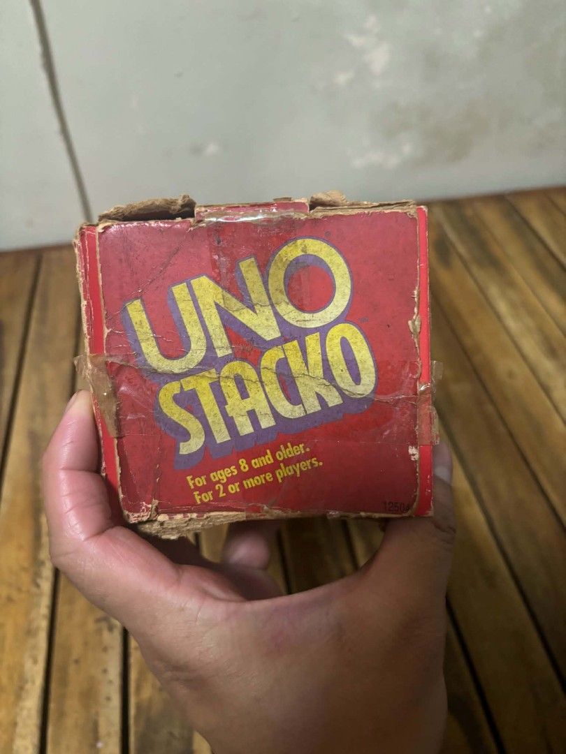 Mattel UNO Stacko Stacking Tower Game (Category: Board Games & Puzzles) located in Caloocan City. Submitted by joshuadyogi0122 (Listing ID 1468512159, Image 3). Description: - Authentic Mattel UNO Stacko game - Combines classic tower stacking with fun UNO rules, colors, and numbers - Set includes 51 wooden-style blocks, 1 UNO custom die, and a loading tray - For ages 8 and up, ideal for 2 or more players.