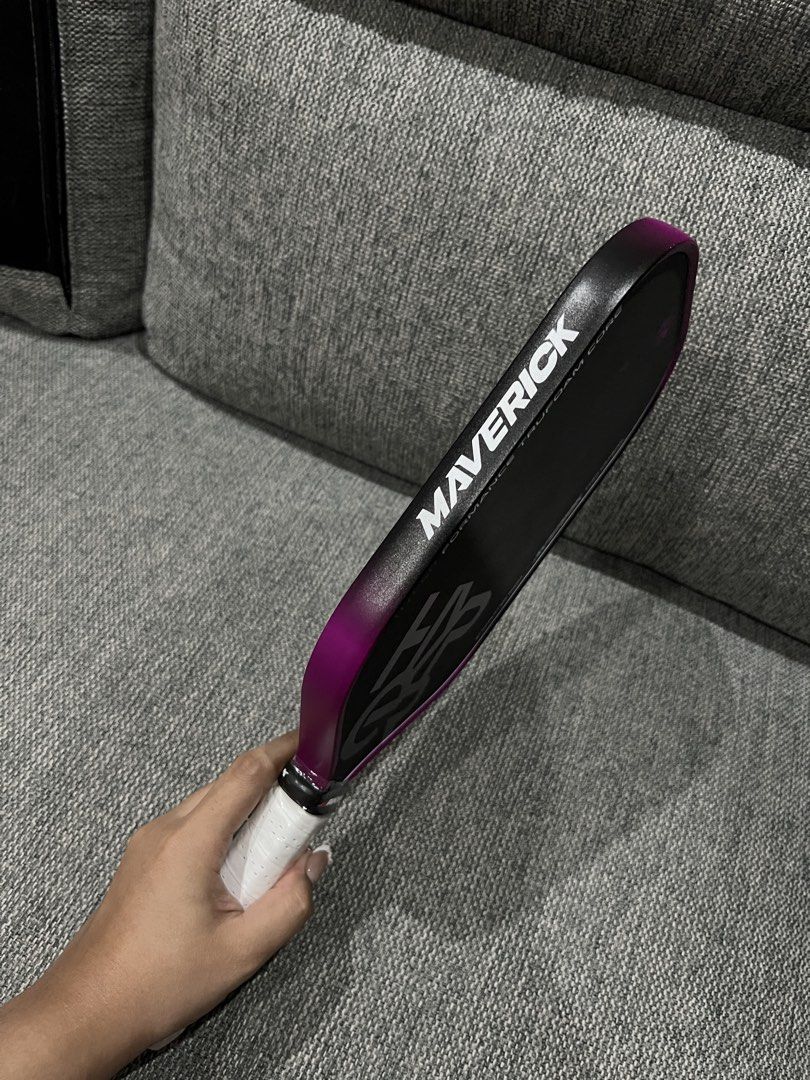 maverick pickleball paddle 💜 (Category: Sports & Fitness Nutrition) located in Bulacan. Submitted by iyahxye (Listing ID 1468684076, Image 2). Description: maverick pickleball paddle 💜 ♡ maverick hyper performance truefoam core 700 carbon ♡ purple colorway 💜 ♡ no issue, good condition overall ♡ with cover pa yung handle ♡ issue: may gasgas sa upper part (see pics) rfs: decluttering / need funds pm me if interested! strictly sure buyers only, t