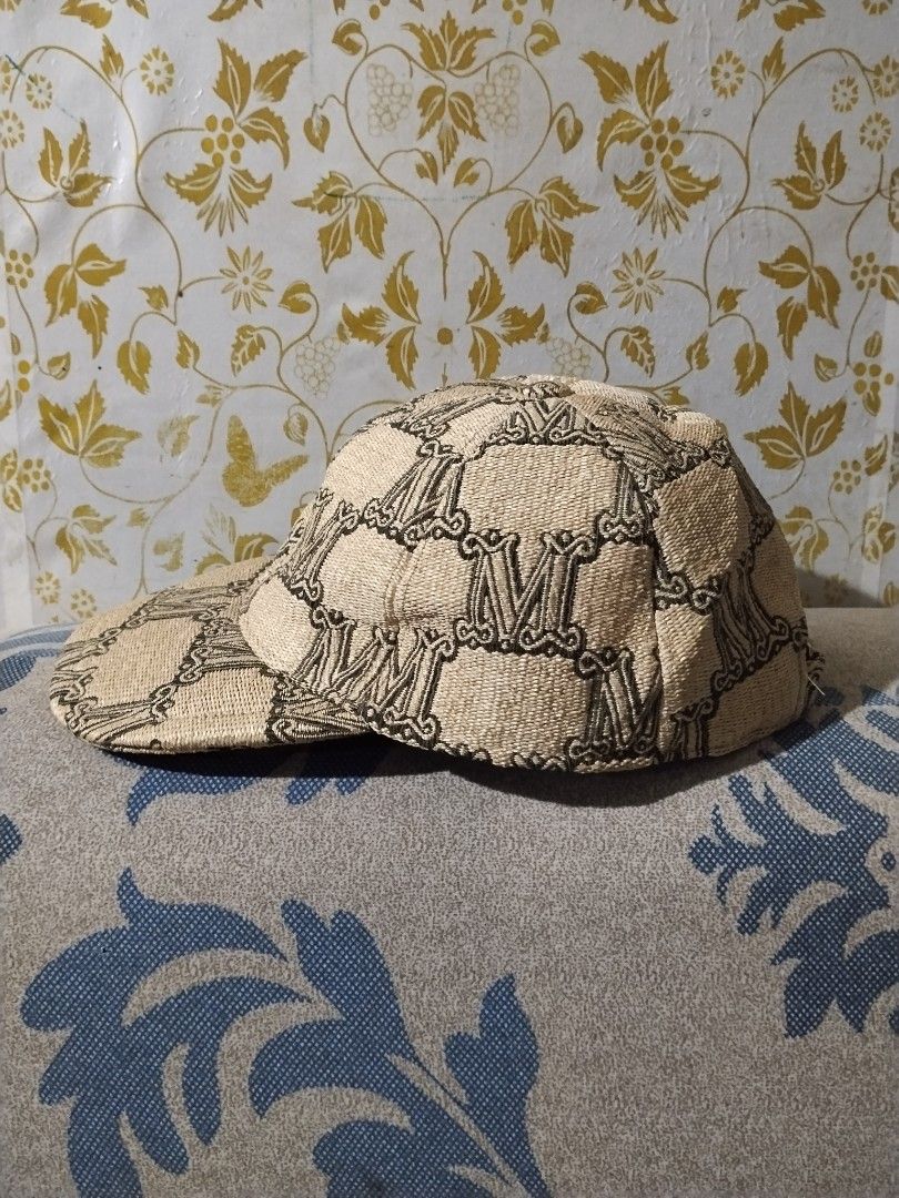 Max Mara monogram baseball cap (Category: Luxury Accessories) located in Talacogon. Submitted by clsthrifty (Listing ID 1468629401, Image 2). Description: *Authentic *Good as new *Size Large (58) *I don't know if issue yang natanggal ibang letra ng care tags kasi I tried to remove the price code of the ukayan owner *See last pic.