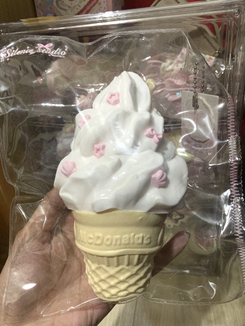 McDonald's Ice Cream Cone Squishy Toy (Category: Plushies & Soft Toys) located in Valenzuela. Submitted by cielittlestuff (Listing ID 1468538769, Image 1). Description: - Authentic Silence Studio McDonald's Ice cream cone Squishy Toy - Design: White soft-serve with pink star sprinkles and yellow embossed waffle cone - Texture: Super slow-rising, perfect for fun stress relief - Packaging: Brand new, sealed in clear plastic bag with a ball chain ta